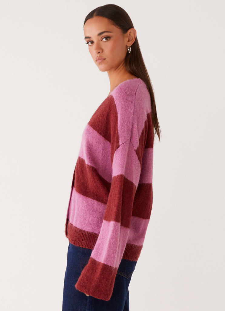 Womens Ainslee Oversized Knit Cardigan in the colour Red Pink Stripe in front of a light grey background