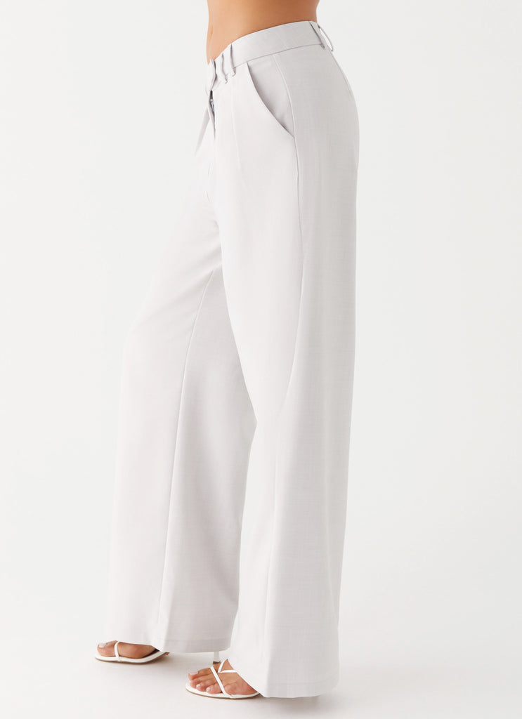 Womens Asha Low Rise Pants in the colour Ivory in front of a light grey background