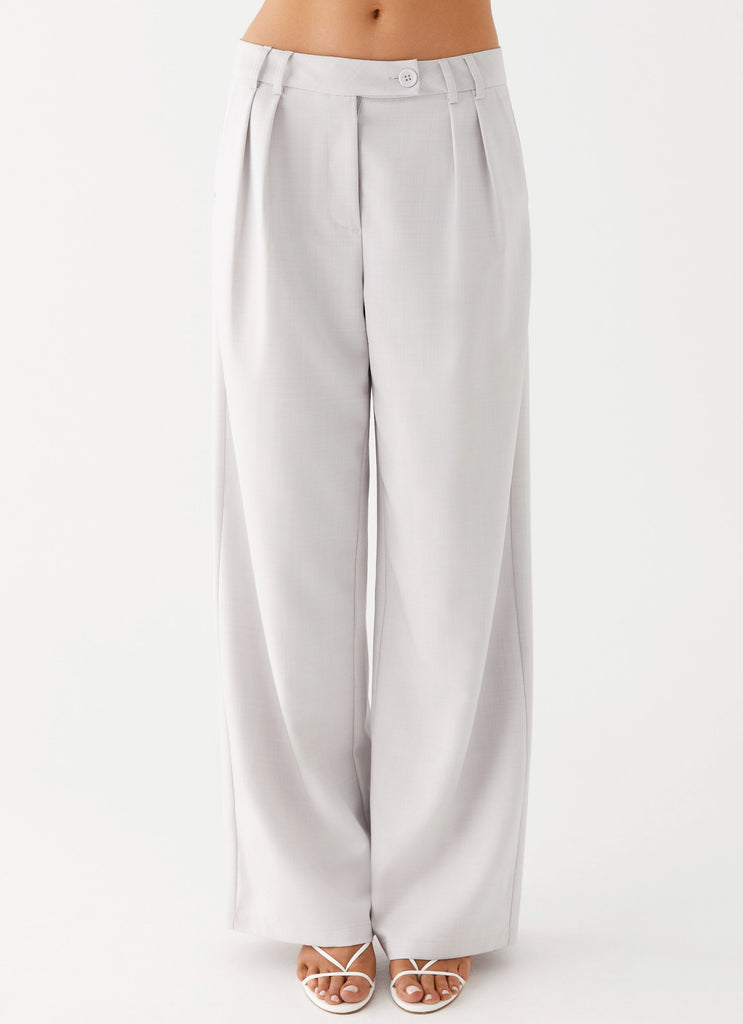 Womens Asha Low Rise Pants in the colour Ivory in front of a light grey background