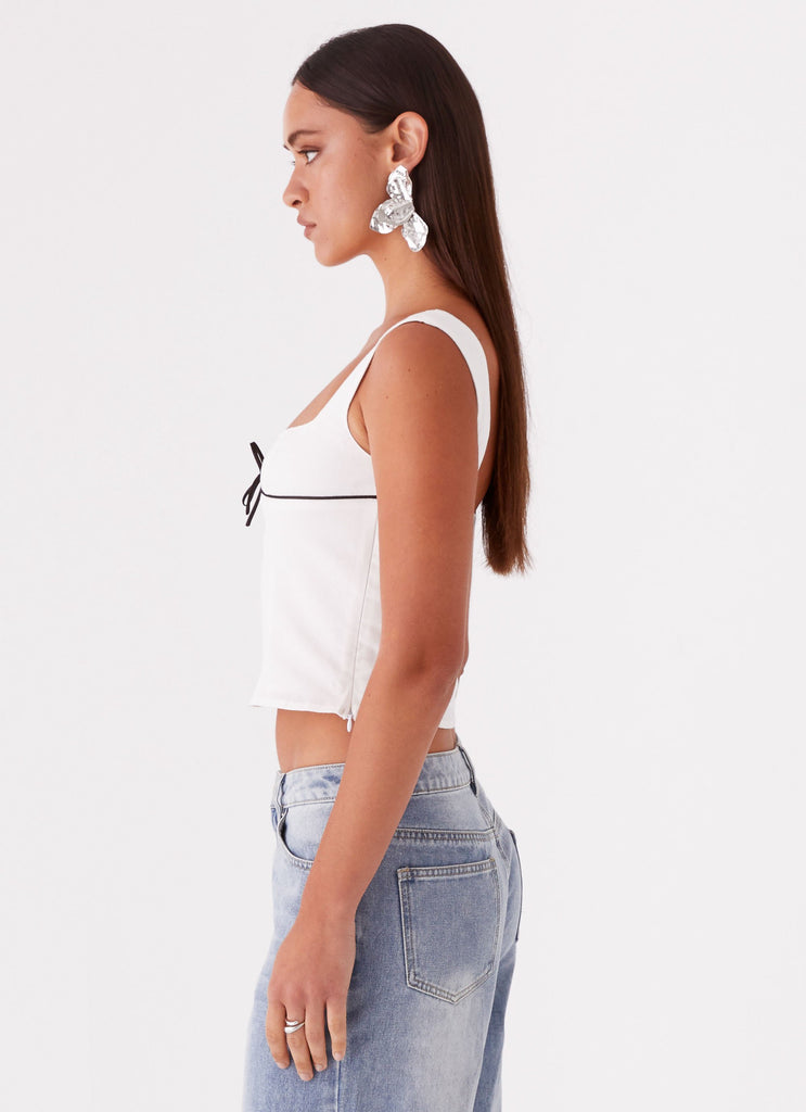 Womens Cadence Top in the colour White in front of a light grey background