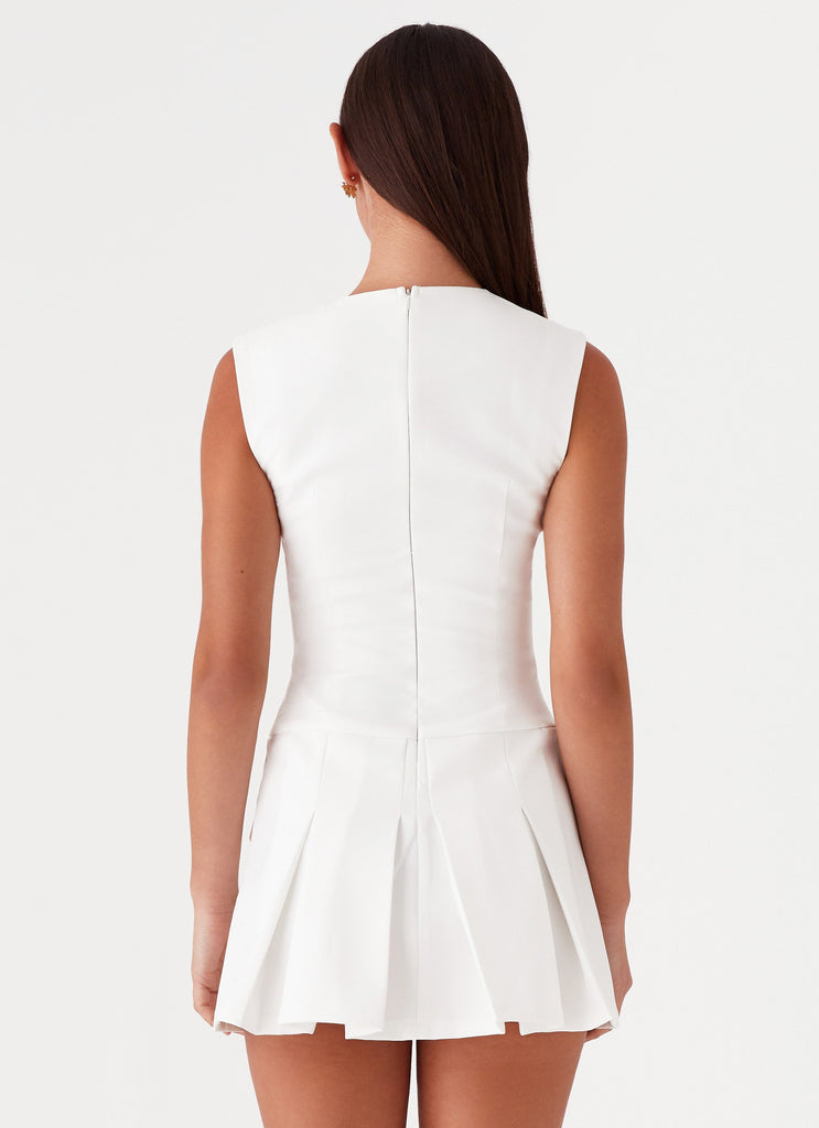 Womens Cassia Mini Dress in the colour White in front of a light grey background