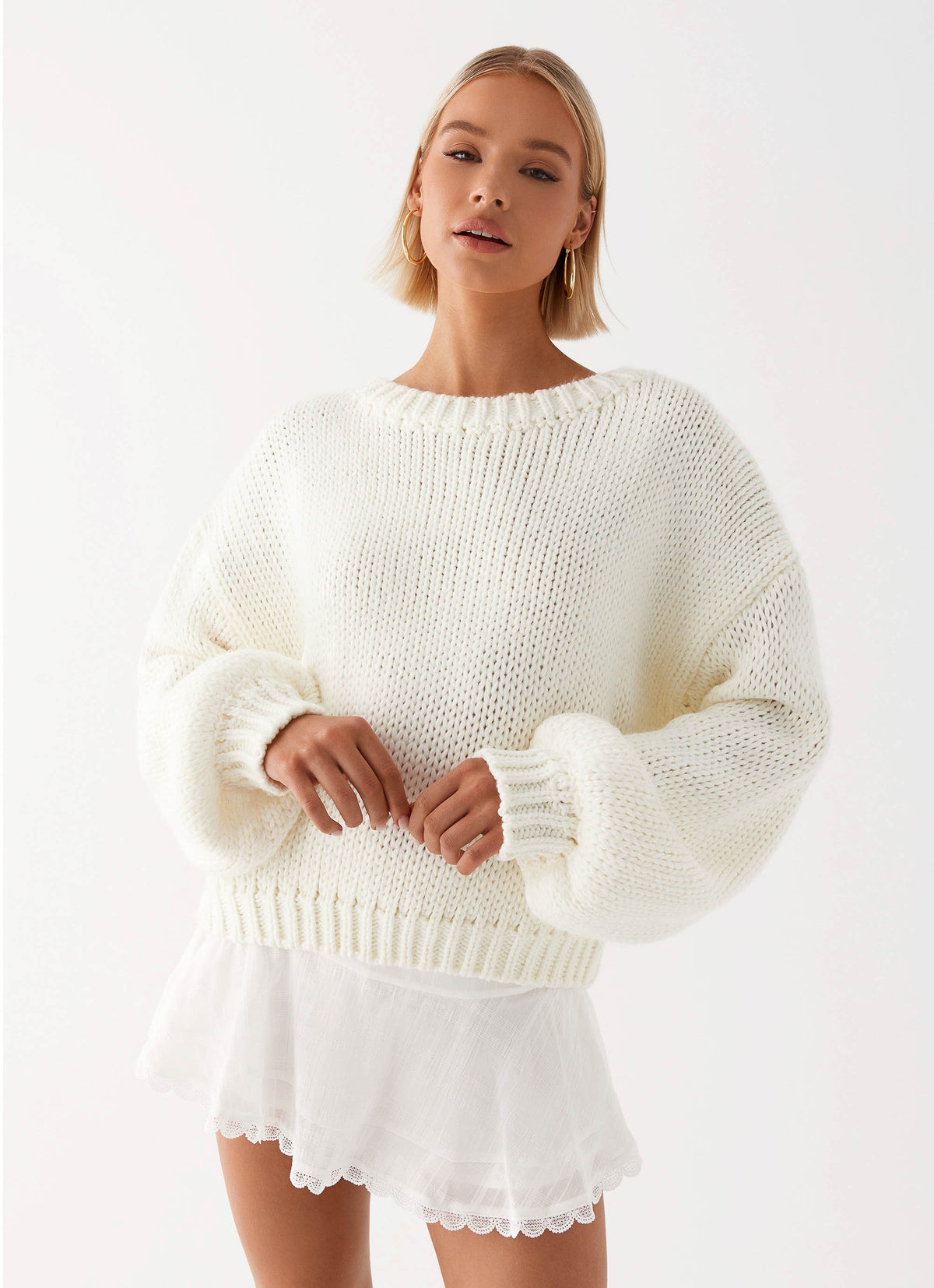 Womens Costella Knit Sweater in the colour Ivory in front of a light grey background