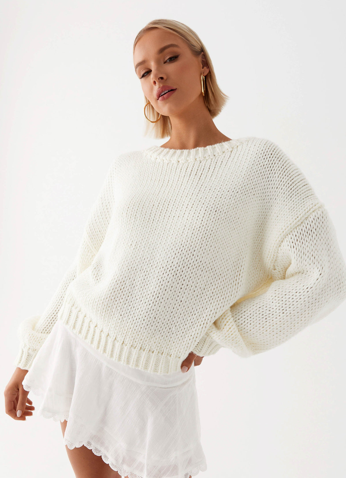 Womens Costella Knit Sweater in the colour Ivory in front of a light grey background