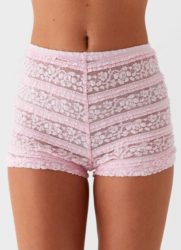 Womens Desert Isle Mini Shorts in the colour Pink in front of a light grey background