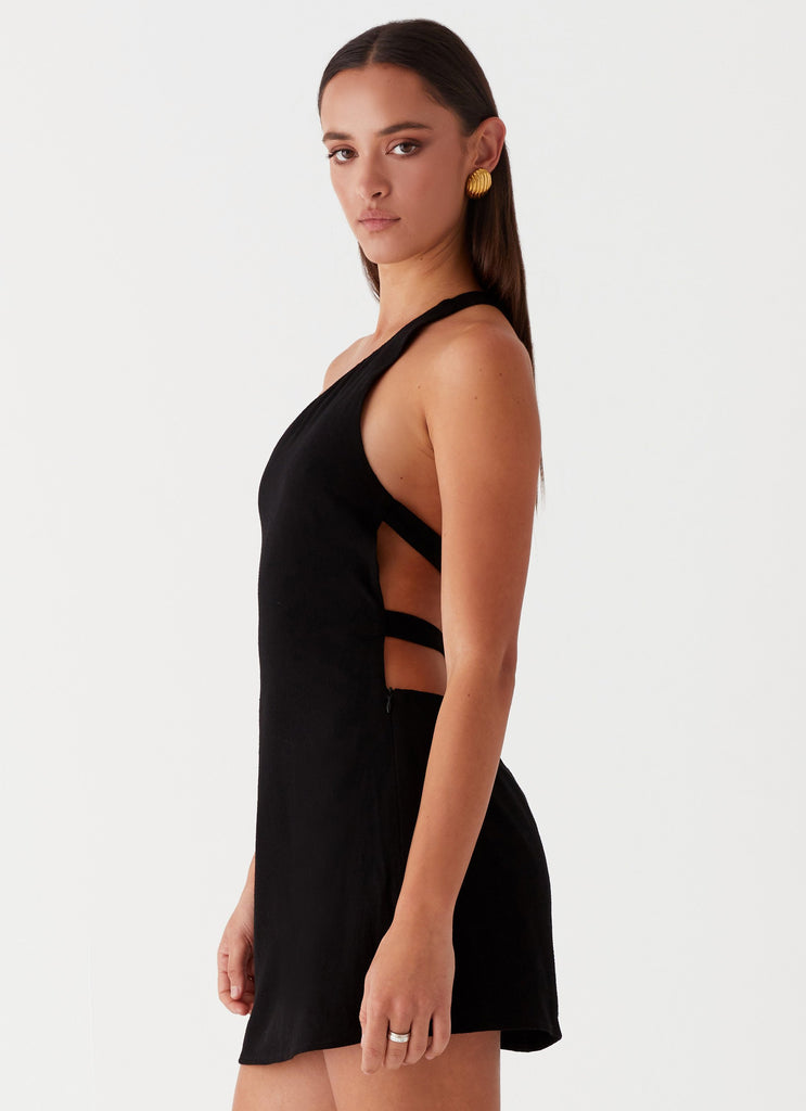 Womens Emilee Tie Back Mini Dress in the colour Black in front of a light grey background