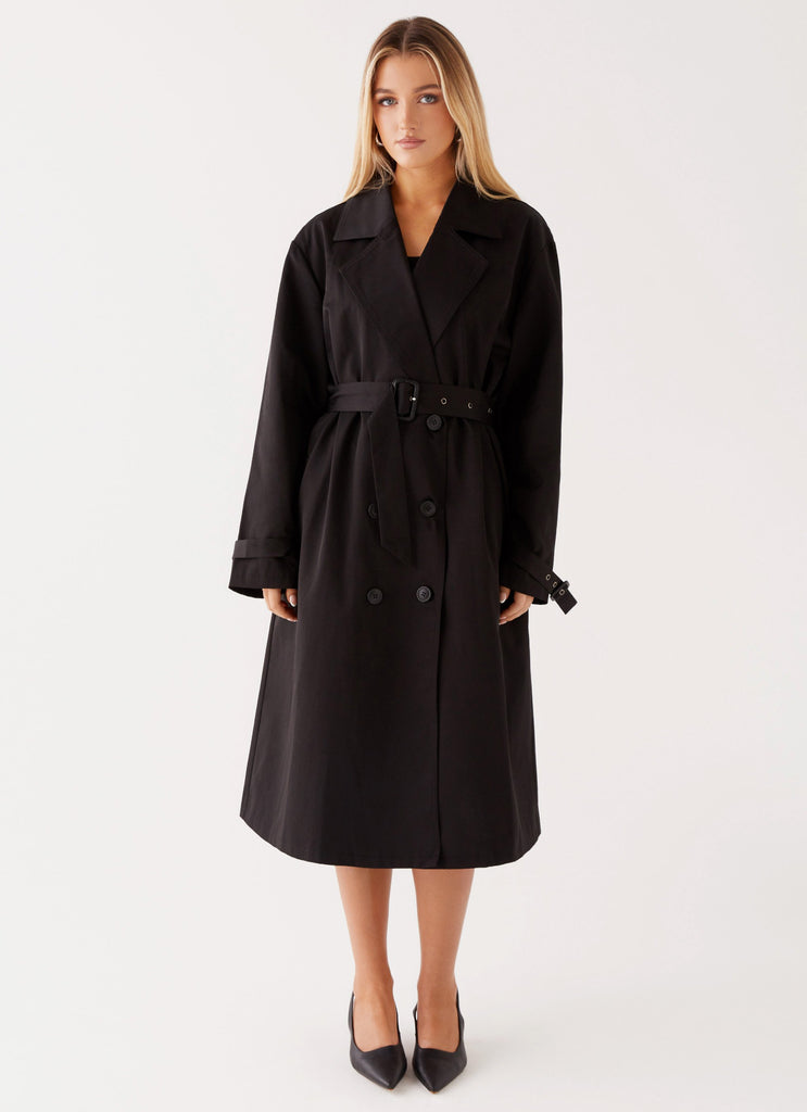 Womens Frenchy Oversized Trench Coat in the colour Black in front of a light grey background