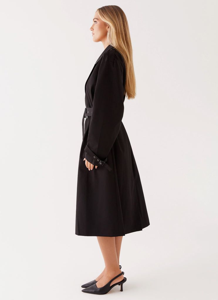 Womens Frenchy Oversized Trench Coat in the colour Black in front of a light grey background