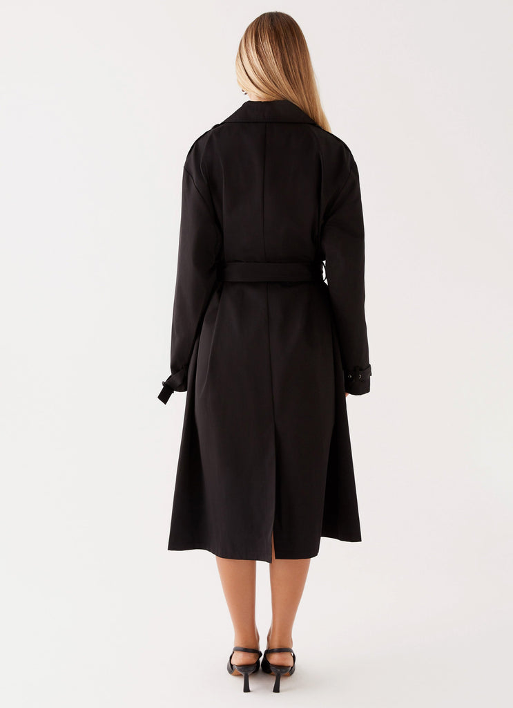 Womens Frenchy Oversized Trench Coat in the colour Black in front of a light grey background
