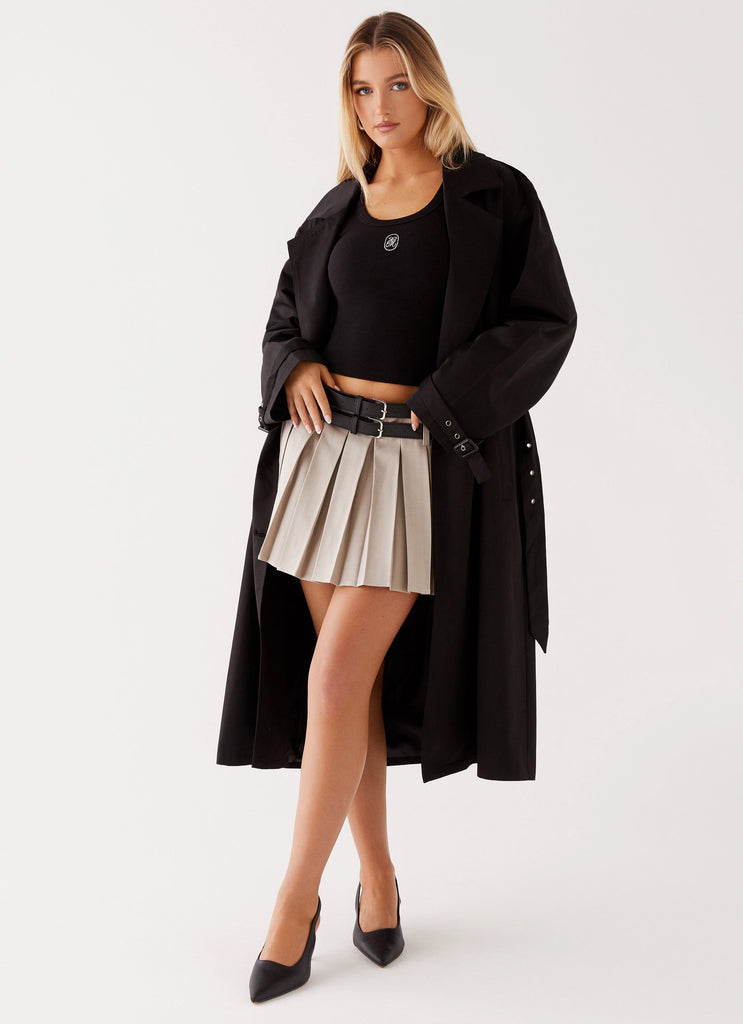 Womens Frenchy Oversized Trench Coat in the colour Black in front of a light grey background