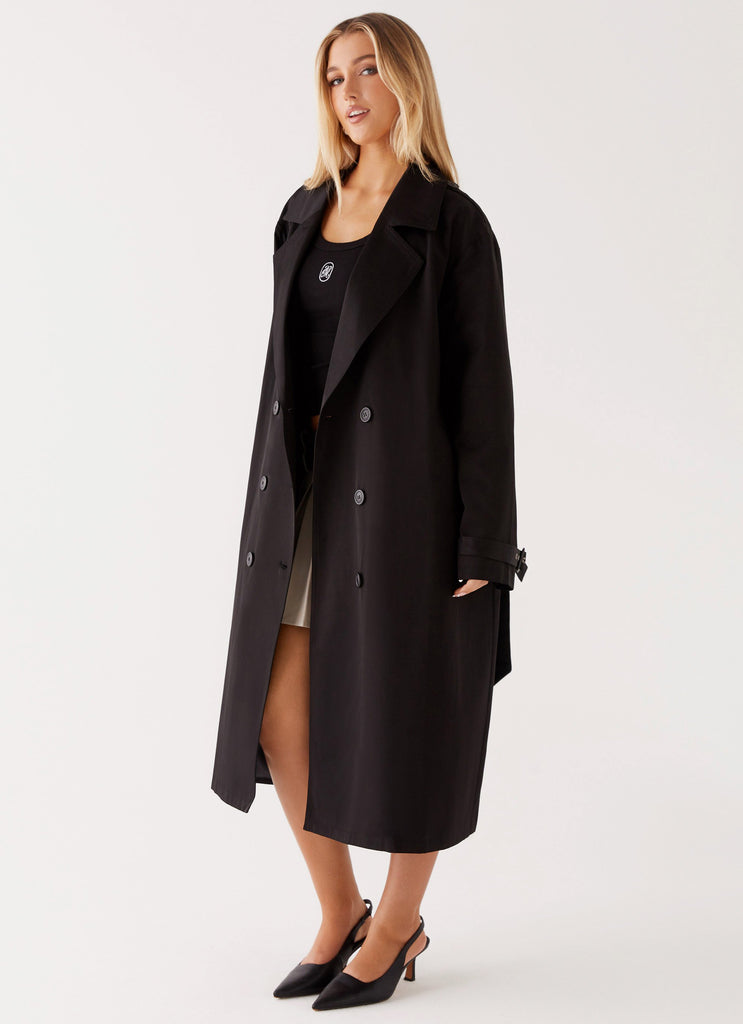 Womens Frenchy Oversized Trench Coat in the colour Black in front of a light grey background