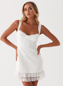 Womens Isadora Lace Mini Dress in the colour White in front of a light grey background