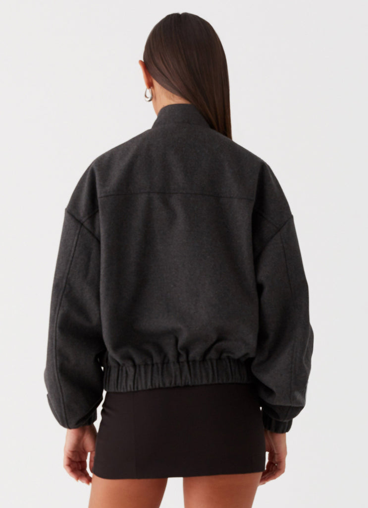 Womens Lorelei Oversized Bomber Jacket in the colour Charcoal in front of a light grey background