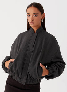 Womens Lorelei Oversized Bomber Jacket in the colour Charcoal in front of a light grey background