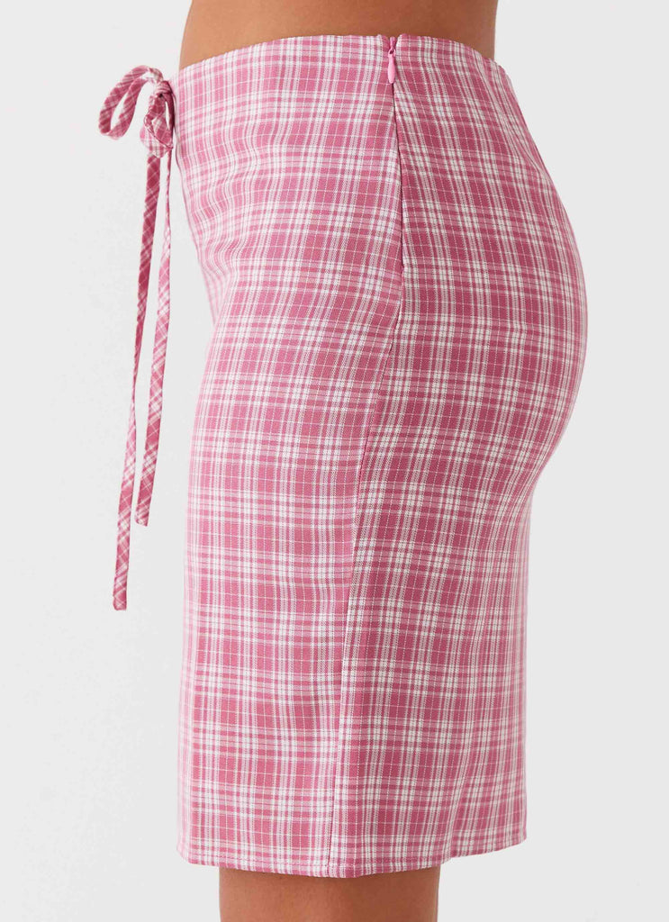 Womens Mamita Midi Skirt in the colour Pink Check in front of a light grey background