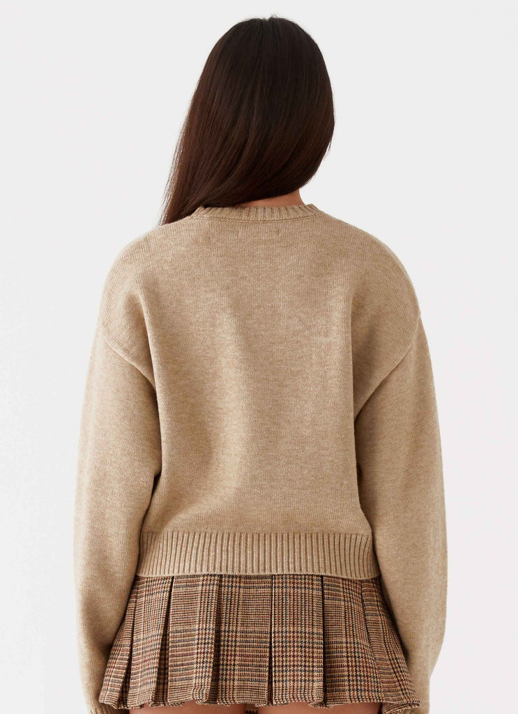 Womens Monika Oversized Jumper in the colour Beige in front of a light grey background