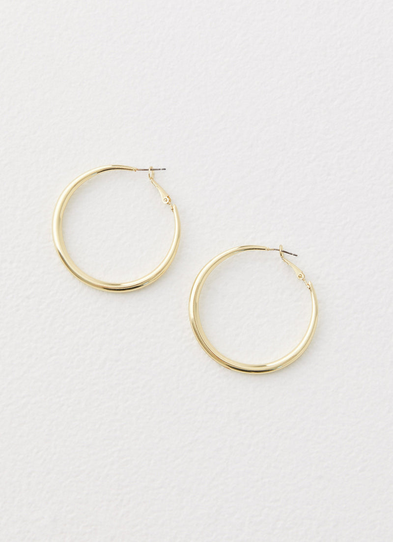Womens Mutual Feelings Earrings in the colour Gold in front of a light grey background