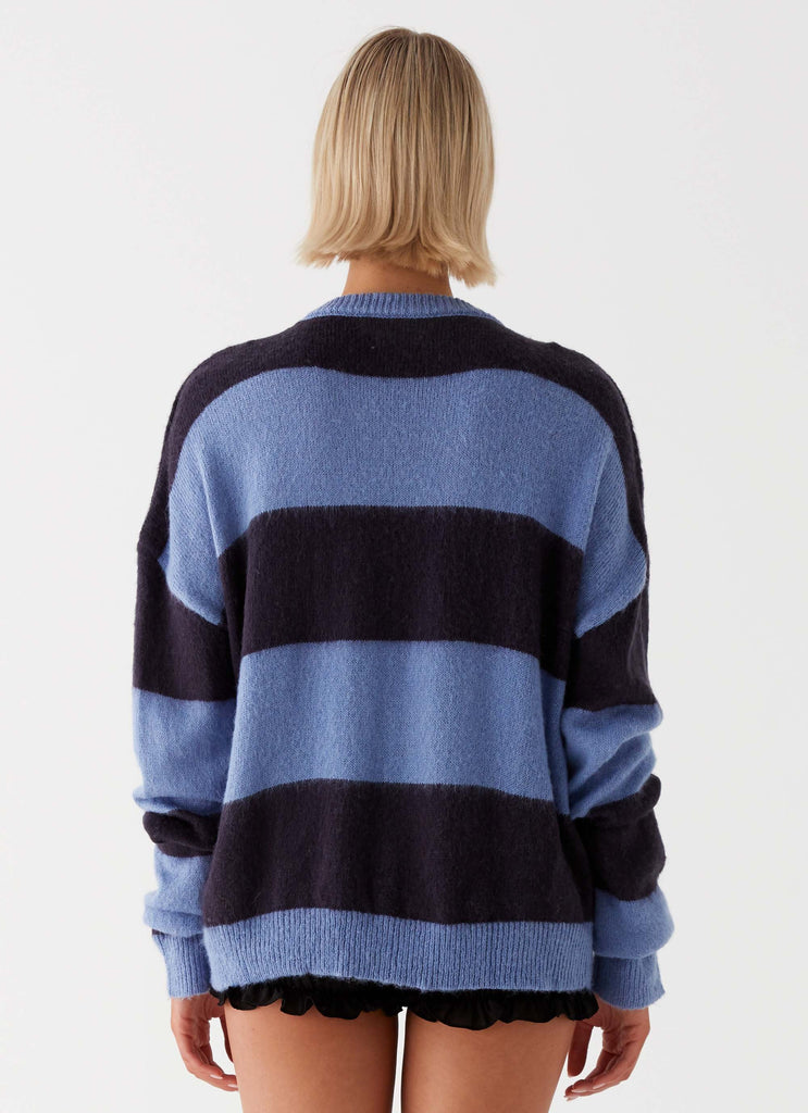 Womens Nikita Fuzzy Knit Sweater in the colour Blue Black Stripe in front of a light grey background