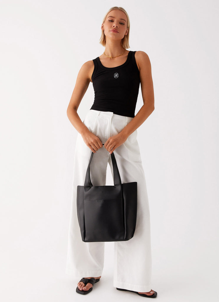 Womens One Of Yours Bag in the colour Black in front of a light grey background