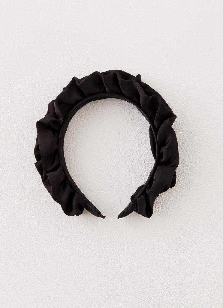 Womens Only Exception Headband in the colour Black in front of a light grey background