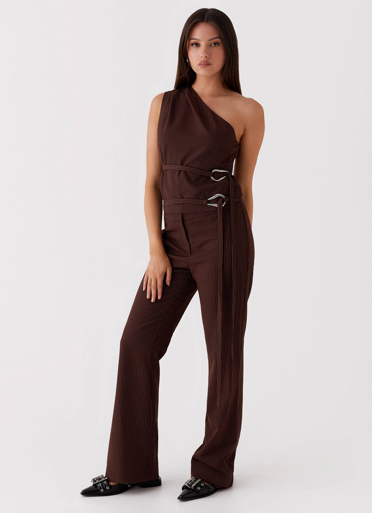 Womens Orla Fitted Flare Pants in the colour Chocolate in front of a light grey background