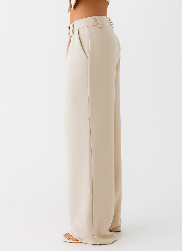 Womens Midnight City Suit Pants in the colour Beige in front of a light grey background