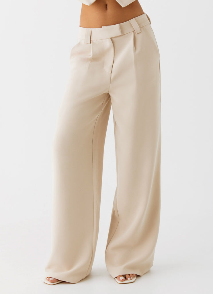 Womens Midnight City Suit Pants in the colour Beige in front of a light grey background