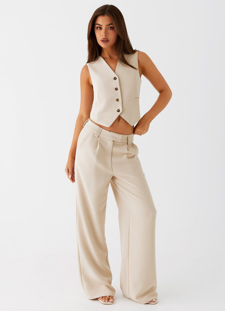 Womens Midnight City Suit Pants in the colour Beige in front of a light grey background