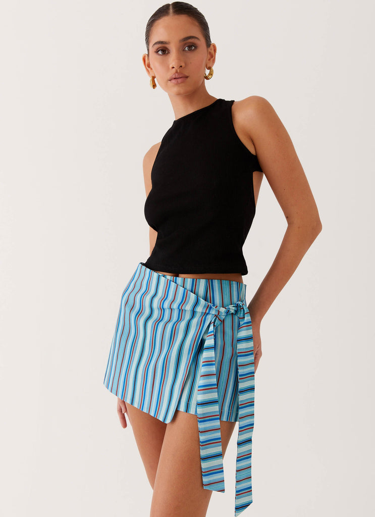 Womens Steal Away Linen Wrap Skirt in the colour Blue Stripe in front of a light grey background