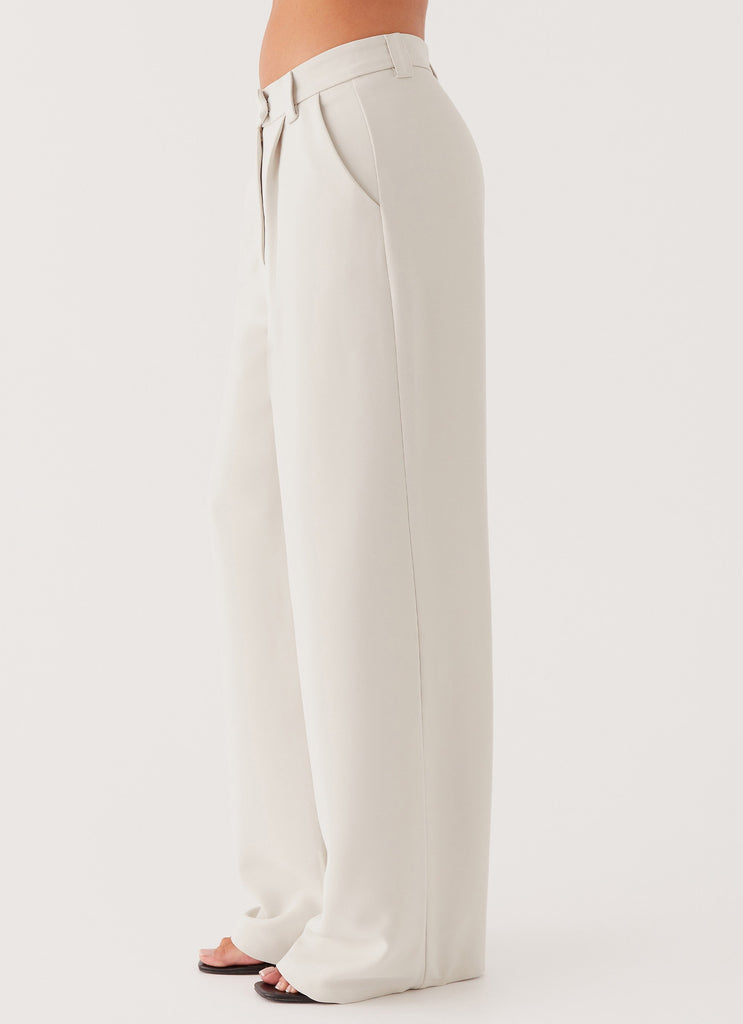 Womens Midnight City Suit Pants in the colour Pebble in front of a light grey background