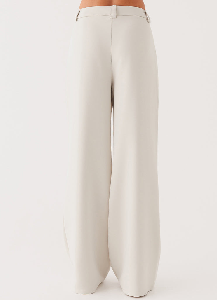 Womens Midnight City Suit Pants in the colour Pebble in front of a light grey background