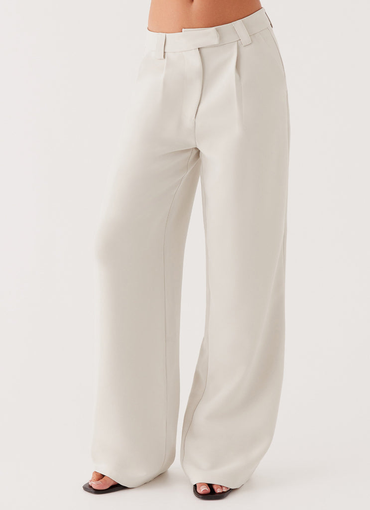 Womens Midnight City Suit Pants in the colour Pebble in front of a light grey background