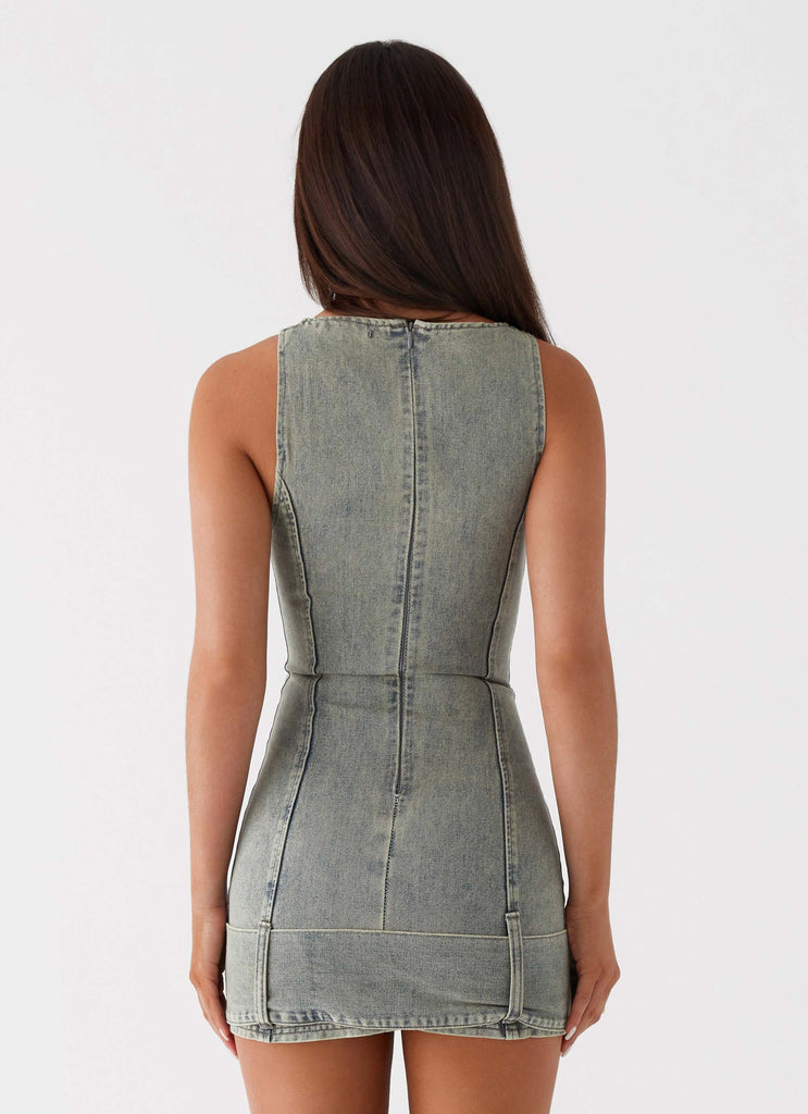 Womens Dark Matter Mini Dress in the colour Washed Denim in front of a light grey background