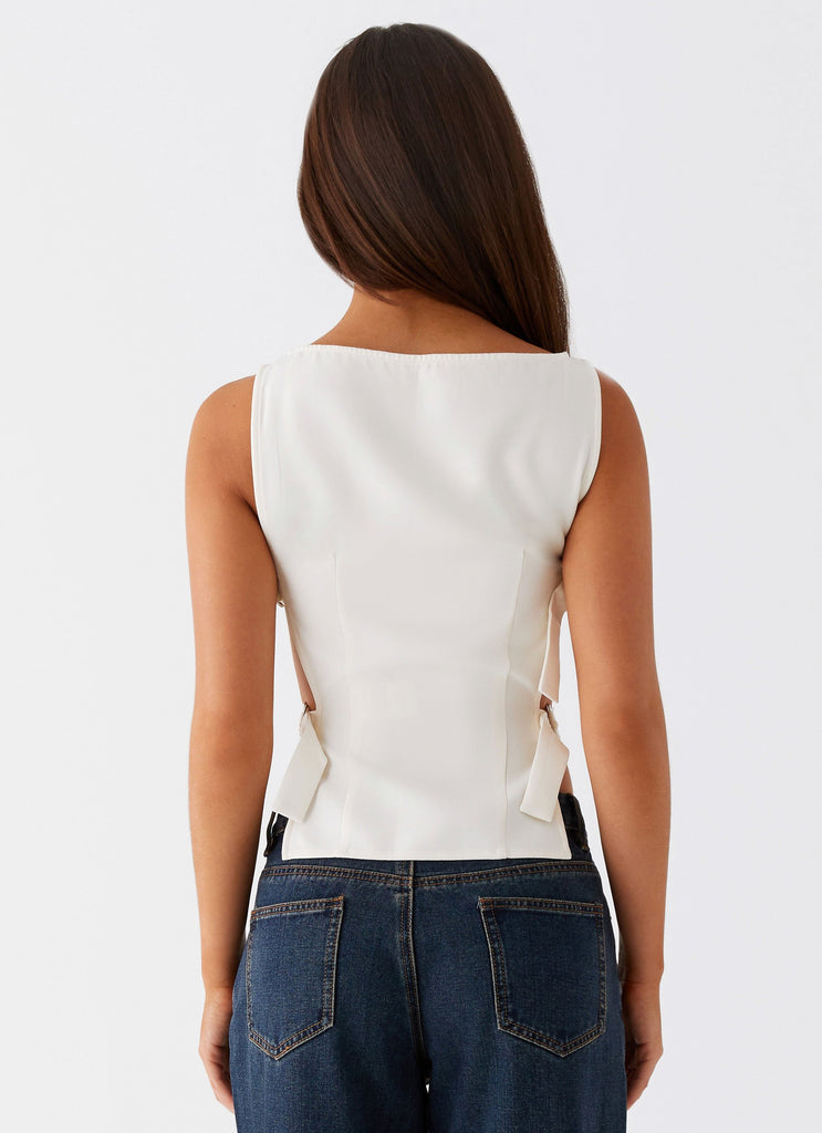 Womens Cherish You Buckle Top in the colour White in front of a light grey background