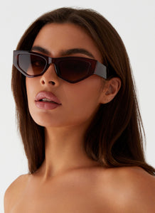 Womens Kyia Sunglasses in the colour Brown in front of a light grey background