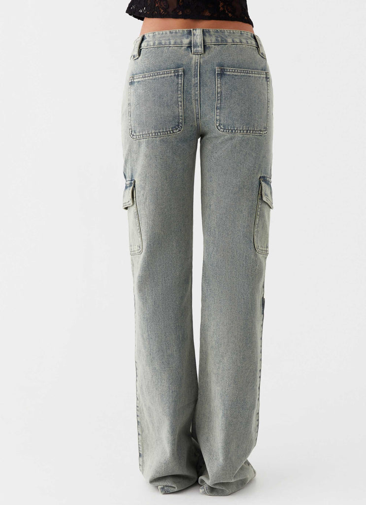 Womens Zephee Flare Jeans in the colour Washed Denim in front of a light grey background