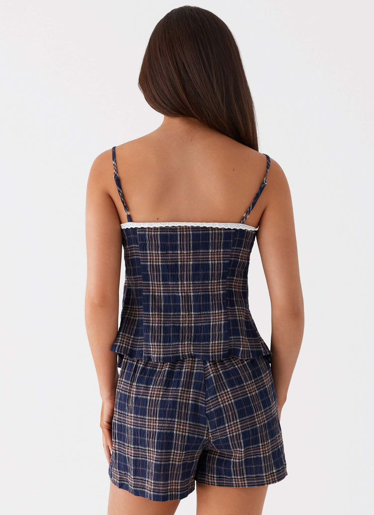 Womens Tamaira Top in the colour Navy Check in front of a light grey background