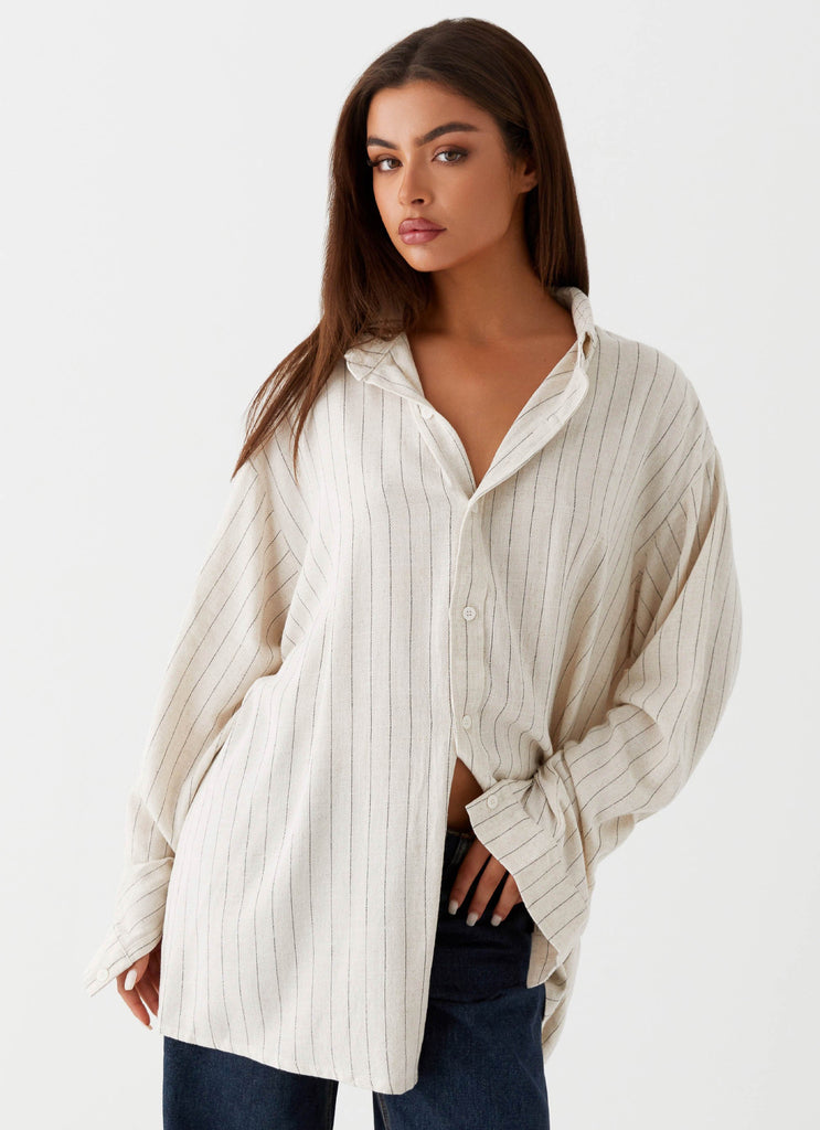 Womens Lockie Oversized Linen Shirt in the colour Oat Pinstripe in front of a light grey background