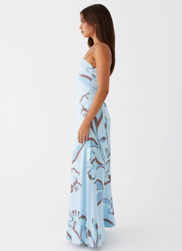 Womens Aster Bloom Maxi Dress in the colour Blue Floral in front of a light grey background