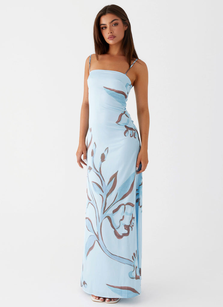 Womens Aster Bloom Maxi Dress in the colour Blue Floral in front of a light grey background