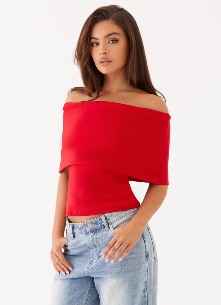 Womens Nellie Knit Top in the colour Cherry in front of a light grey background