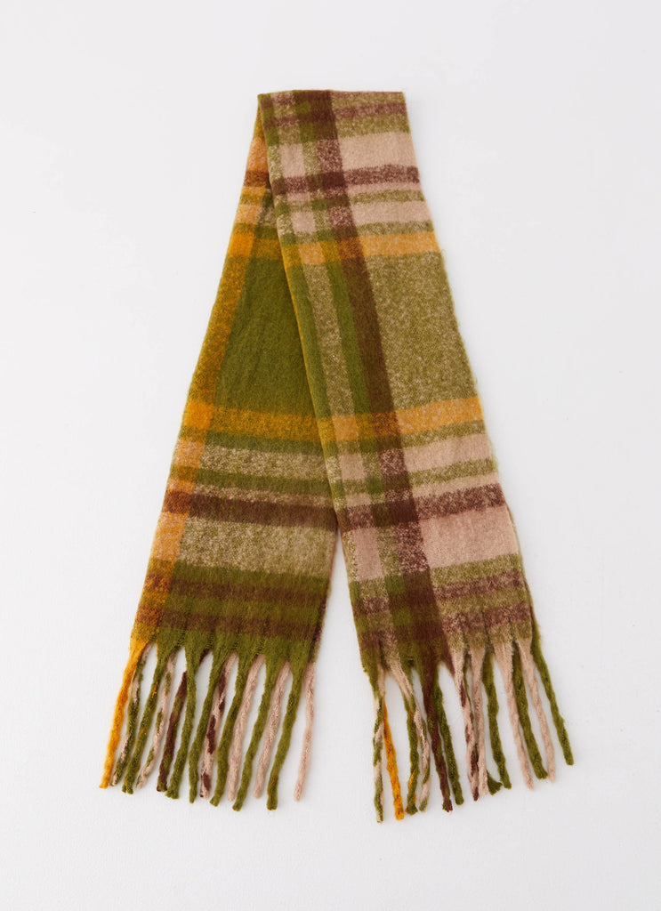 Womens Rainier Plaid Scarf in the colour Green in front of a light grey background