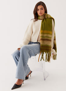 Womens Rainier Plaid Scarf in the colour Green in front of a light grey background