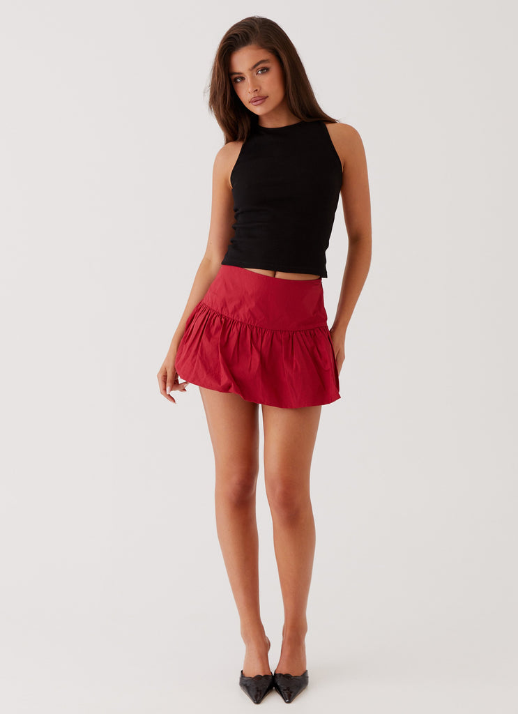 Womens Hotel California Low Rise Mini Skirt in the colour Red in front of a light grey background