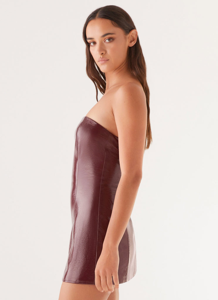 Womens Big Shot Strapless Mini Dress in the colour Merlot in front of a light grey background