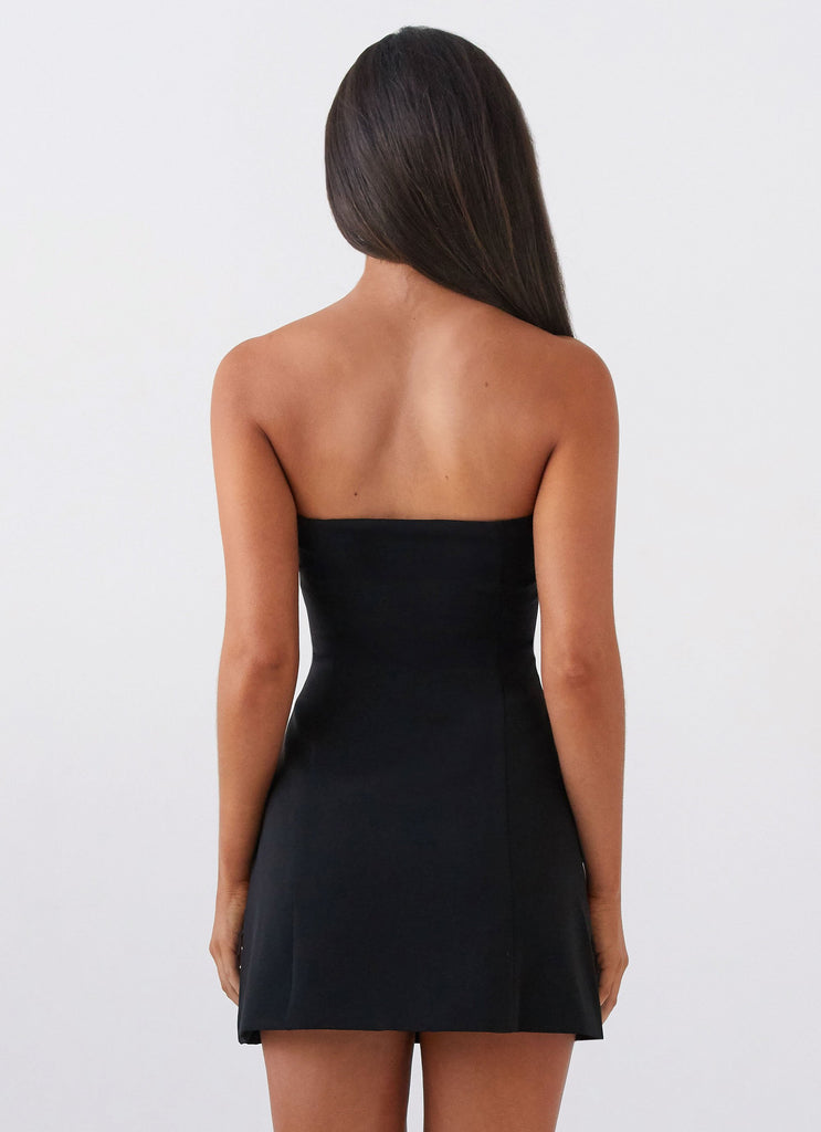 Womens Allora Strapless Mini Dress in the colour Black in front of a light grey background