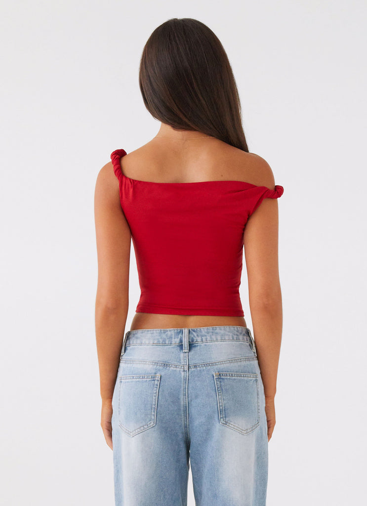 Womens Solace Soul Twist Shoulder Top in the colour Red in front of a light grey background