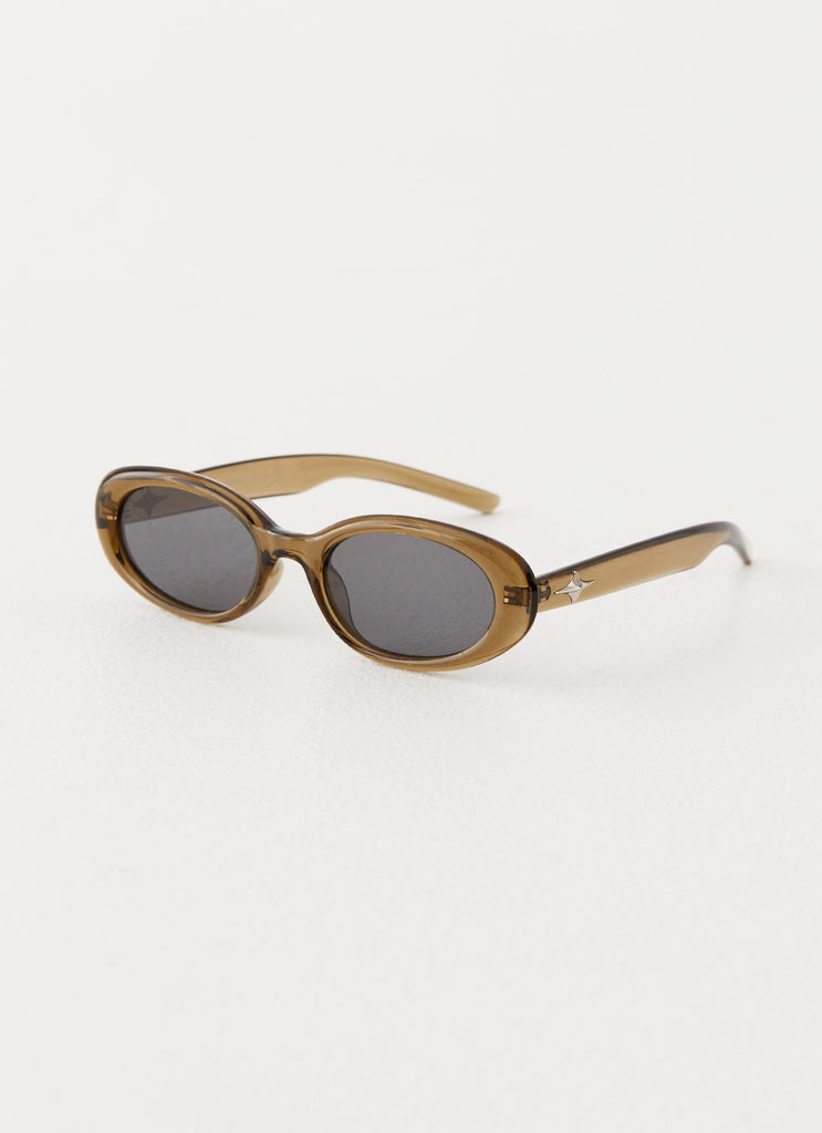 Womens Raphy Sunglasses in the colour Khaki in front of a light grey background