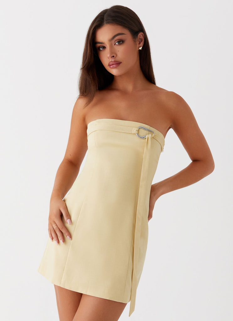 Womens Saskia Mini Dress in the colour Yellow in front of a light grey background