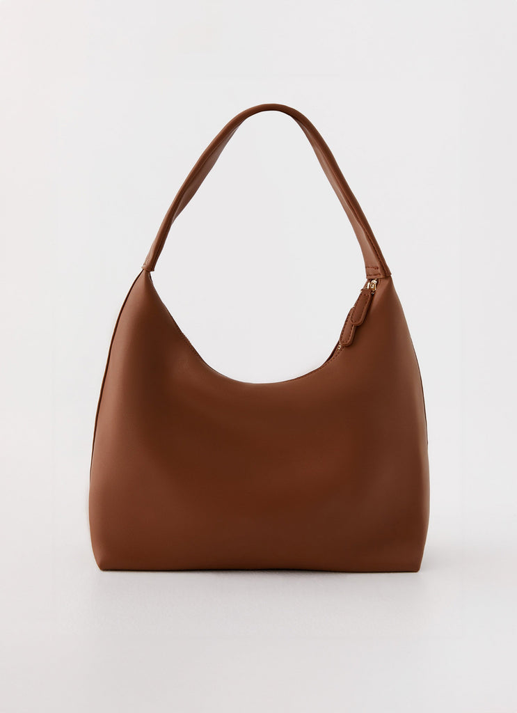 Womens Whitney Shoulder Bag in the colour Brown in front of a light grey background