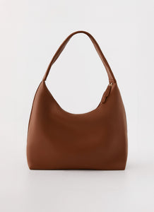 Womens Whitney Shoulder Bag in the colour Brown in front of a light grey background